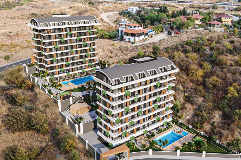 Аланияның өркендеген Демирташ ауданындағы теңіз көріністі жаңа пәтерлер мен дуплекстер