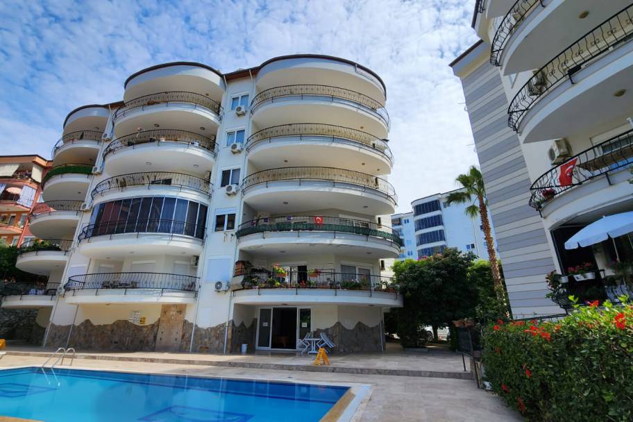 Простора мебльована квартира з каміном та басейном у Чікчіллі, Аланія