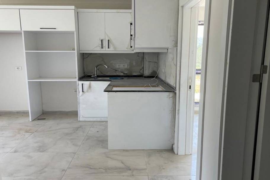 Аланияның өркендеген Демирташ ауданындағы теңіз көріністі жаңа пәтерлер мен дуплекстер