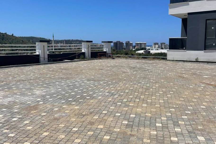 Аланияның өркендеген Демирташ ауданындағы теңіз көріністі жаңа пәтерлер мен дуплекстер