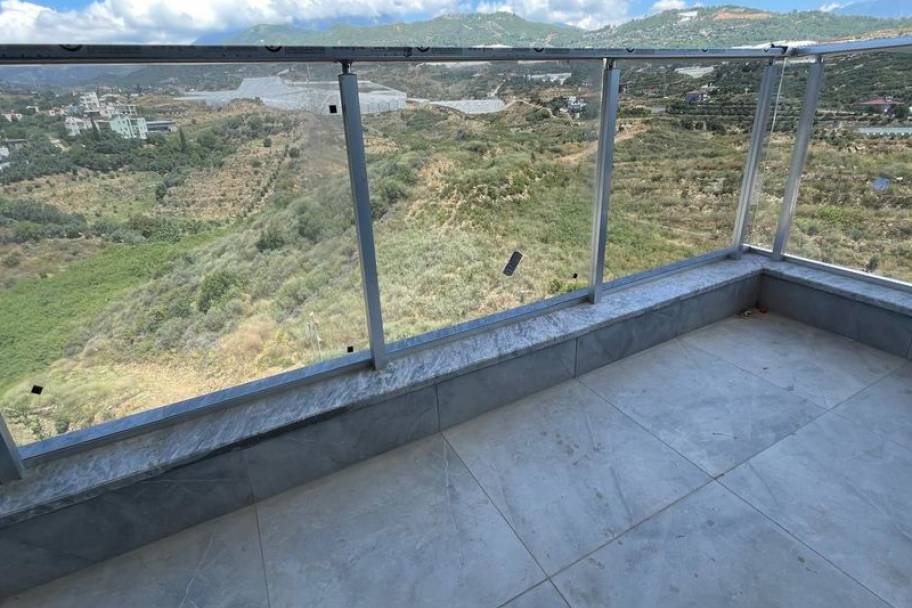 Аланияның өркендеген Демирташ ауданындағы теңіз көріністі жаңа пәтерлер мен дуплекстер